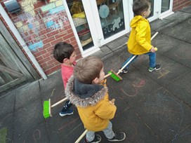 Preschool Children playing on Patio.jfif