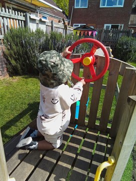 Child on climbing frame.jfif